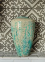 A handsome vintage turquoise pottery is giving place of honor in the kitchen