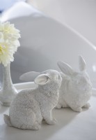 Decorative white ceramic rabbits