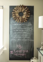 A chalkboard keeps track of artistic projects.
