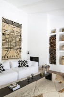 Modern living room with fabric wall hanging