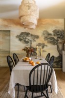 Mural painted feature wall in vintage style dining room