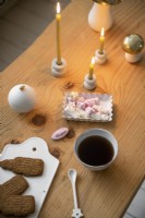 Festive sweets and biscuits on wooden coffee table - detail