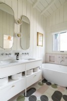 White country bathroom with modern spotted flooring