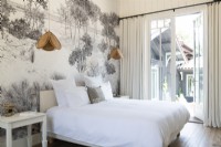 Grey mural wall in white country bedroom