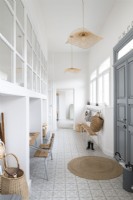 Modern white and grey painted hallway - converted school