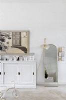 White and pale grey living room sideboard and mirror