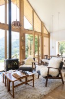 Sheepskin rugs on chairs in modern country living room