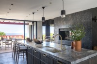 Contemporary grey kitchen with marble island worktop 