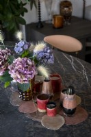 Flowers in vase on marble dining table - detail