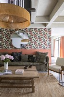 Modern living room with patterned wallpaper feature wall