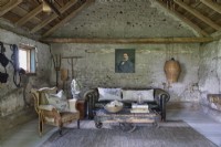Bare stone walls in rustic living room 