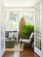 Sunroom with vintage furniture and surf theme