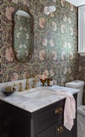 Floral patterned wallpaper in classic style bathroom