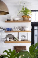 Kitchenware on floating shelves