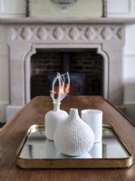 Vase detail with fireplace background