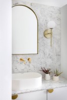 Neutral bathroom with gold accents