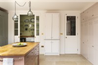 Contemporary classic kitchen with pantry and storage.