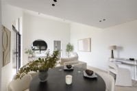 Modern open plan living/dining area in an apartment