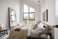 Modern bedroom with large window