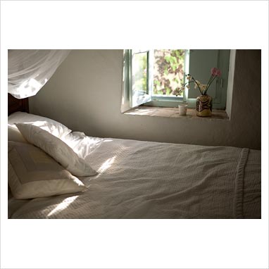 GAP Interiors - Bed next to small window - Picture library ...