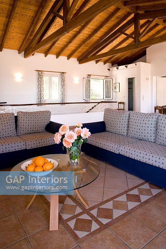 Villa Christina, Kaminaki, Corfu, Greece  Open plan living room with sofas and coffee table