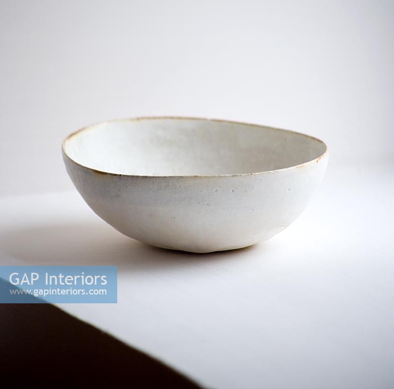 Detail of white pottery bowl