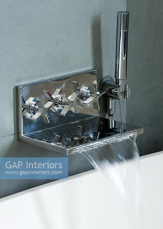 Modern  contemporary wall mounted chrome tap and hand shower