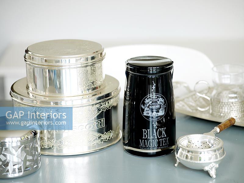 Details of silver tea set on display 