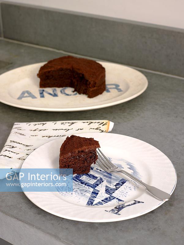 Detail of plates with chocolate cake