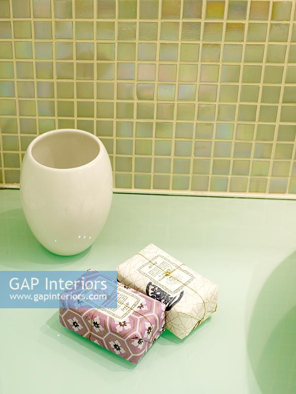 Detail of toothbrush holder and bars of soap