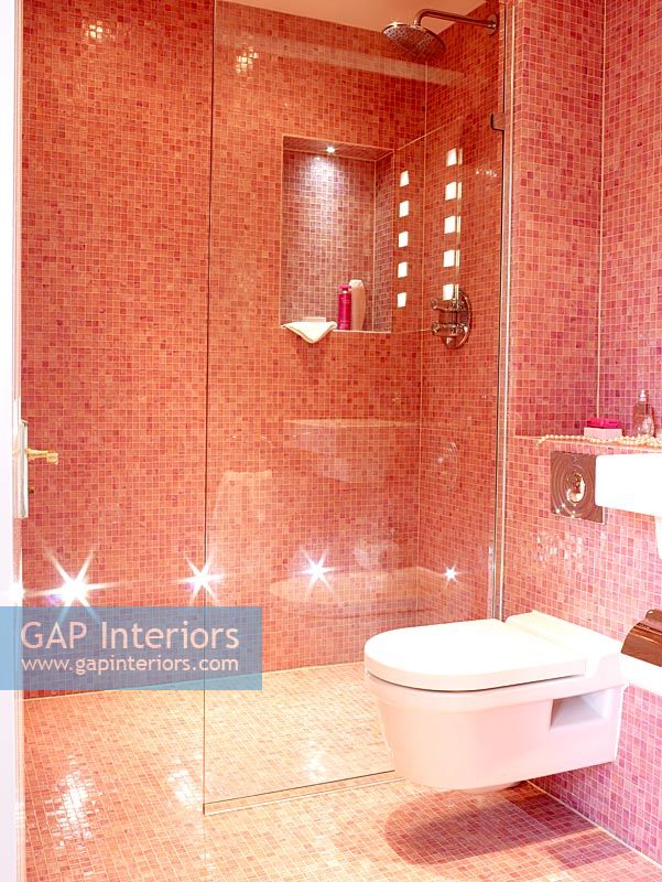 Modern bathroom with pink mosaic tiles