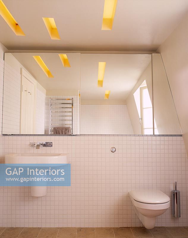 Modern bathroom with strip lighting 