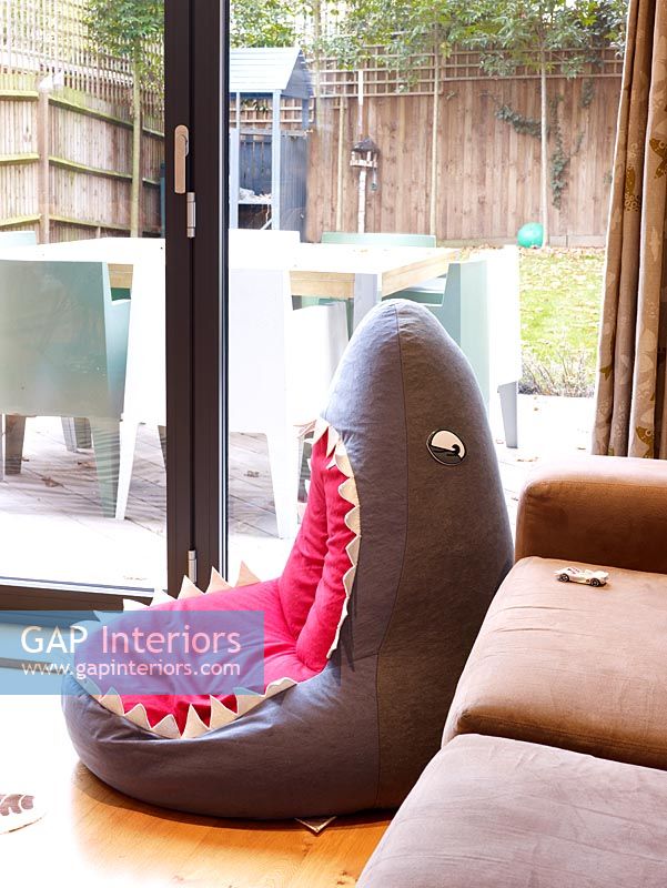 Modern living room with shark head beanbag 