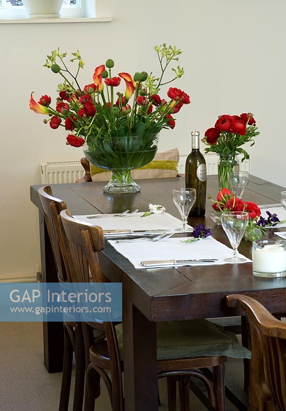 Dining room with table and flowers