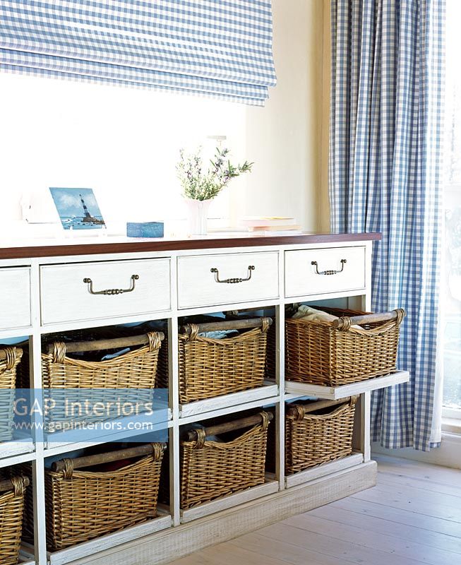 Chest of drawers with wicker baskets 