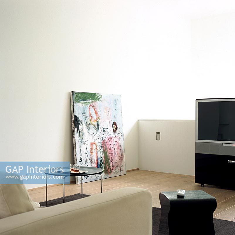 Flat screen television and sofa in modern living room