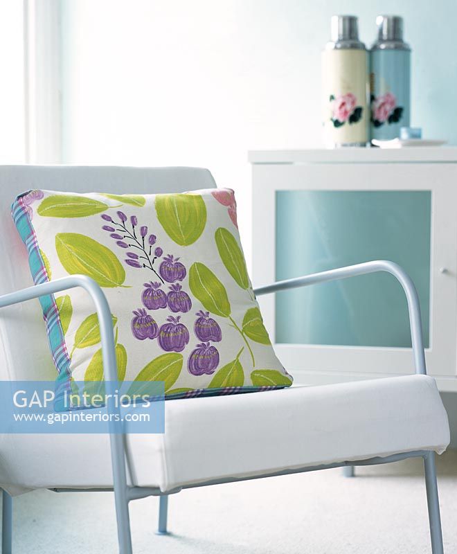 Floral cushion on chair