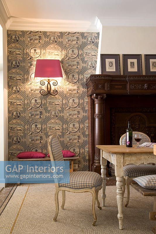 Patterned wallpaper in classic dining room 
