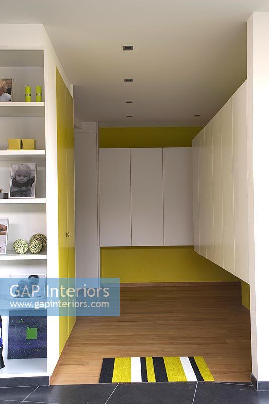 Modern hallway with shelves and cupboards 