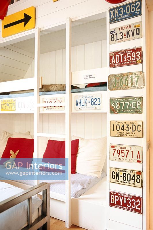 Child's bedroom with bunk beds and vintage license plates