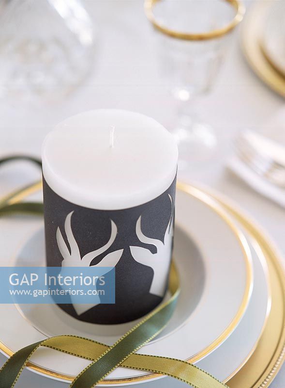 Candle with antelope design