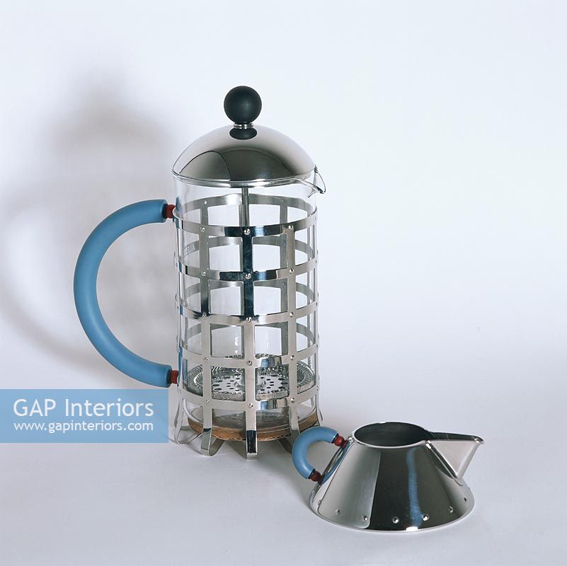 Close-up of a coffee pot and milk jug