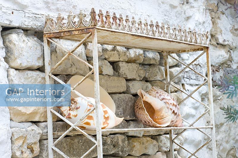 Ornate metal jardinière with shells