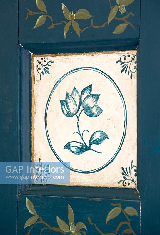 Detail of hand painted cupboard