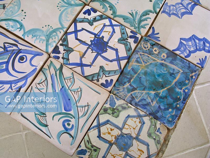 Various blue painted tiles