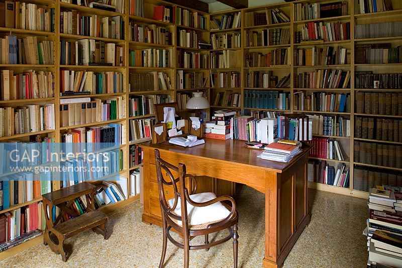 Home Office lined with bookshelves
