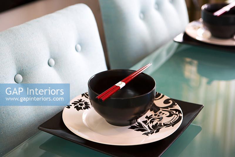 Contemporary glass Dining Table with Place Settings and Chopsticks