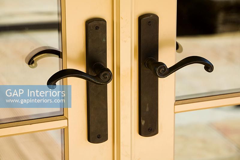 French Doors with Contemporary Wrought Iron Handles