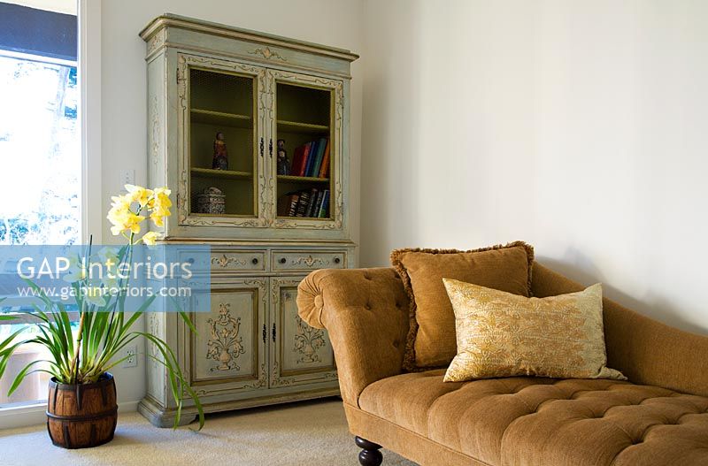 Brown Chase Lounge and Green Armoire