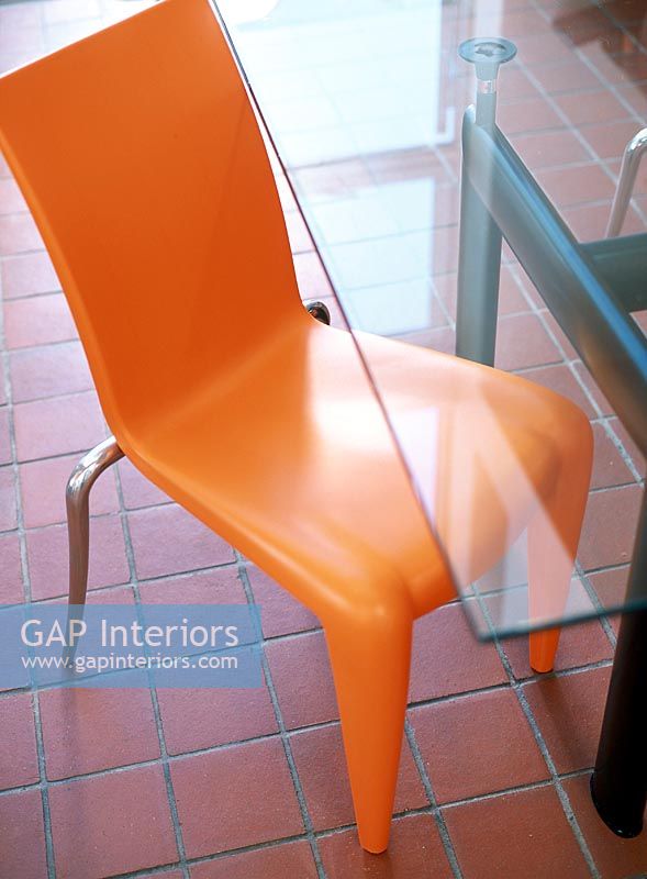 Close-up of a modern orange chair